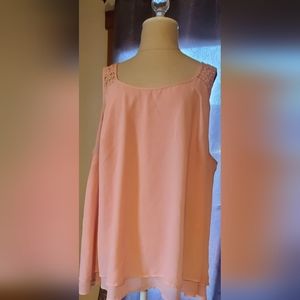 lightlylined, peach tank top with lace trim across the back